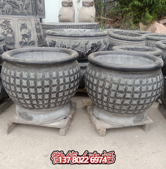 自然美學(xué)結(jié)合青石石雕、浮雕、編織、雕塑的戶外園林魚缸